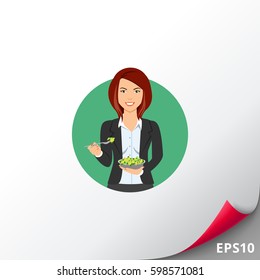 Businesswoman eating salad