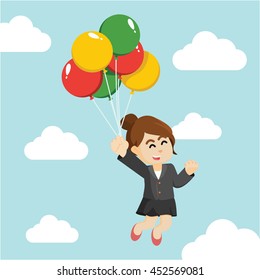 businesswoman flying with balloons