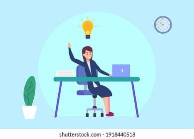 Businesswoman getting bright new idea while working with laptop on desk