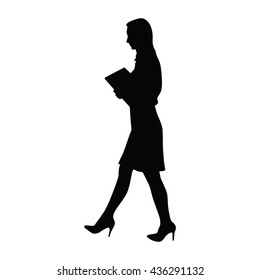 Businesswoman goes and carries in his hand documents, vector silhouette manager, teacher, reporter, lawyer, officer trainees. Side view, profile