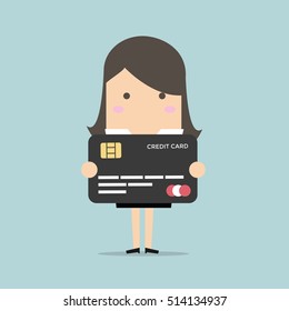 Businesswoman holding a credit card vector