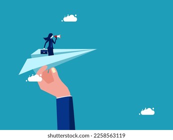 Businesswoman holding a megaphone on a paper plane. Help support advertising and marketing. business concept 