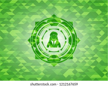 businesswoman icon inside green emblem with mosaic ecological style background