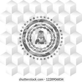 businesswoman icon inside grey badge with geometric cube white background