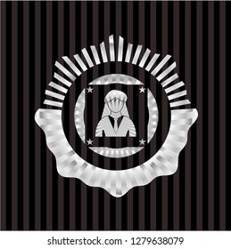 businesswoman icon inside silvery emblem or badge