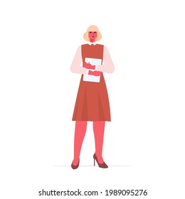 businesswoman leader in formal wear holding laptop successful business woman standing pose leadership