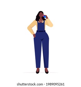 businesswoman leader in formal wear talking phone african american business woman standing pose leadership