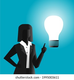 businesswoman and light bulb shining next to it