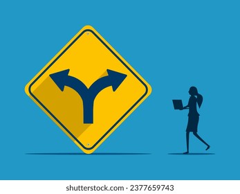 Businesswoman makes decision with two way intersection sign