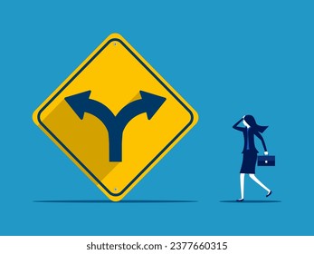 Businesswoman makes decision with two way intersection sign