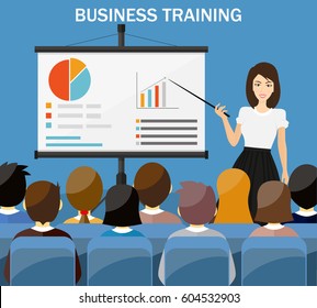 Businesswoman making presentation explaining charts on a white board. Business seminar.