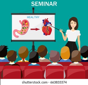 Businesswoman making presentation explaining charts. Healthy lifestyle concept. Doctor show heathy stomach and heart. Human internal organs.Digestion. Digestive tract, system. Healthcare.