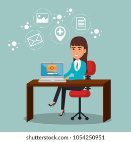 businesswoman in the office with e-mail marketing icons