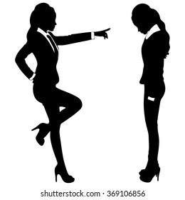 Businesswoman pointing with a finger at anotehr sad woman