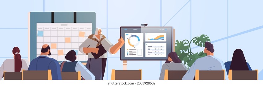 businesswoman presenting financial statistic diagram for businesspeople at conference meeting business presentation