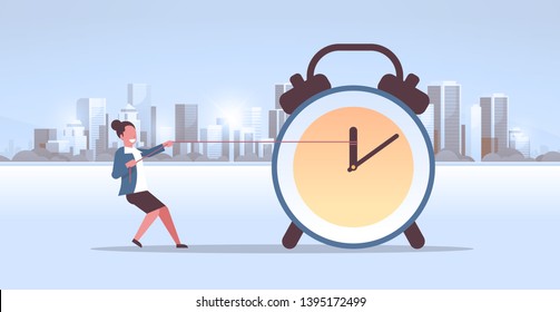 businesswoman pulling clock arrow deadline time management concept business woman pushing back hour hand modern city buildings cityscape background horizontal flat full length