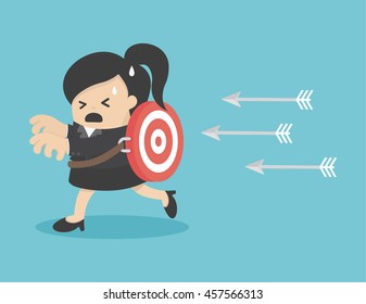 Businesswoman running arrows