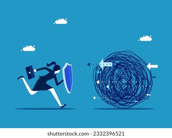 Businesswoman running with a shield to prevent chaos