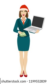 Businesswoman in Santa hat holding a laptop notebook and shows money. Full length portrait of businesswoman in a flat style. Vector illustration.