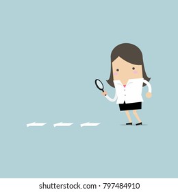 Businesswoman searching through a magnifying glass. Searching, details, clue concept. Flat cartoon style. Vector