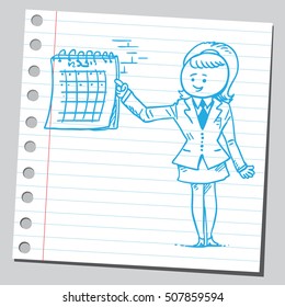 Businesswoman showing on calendar
