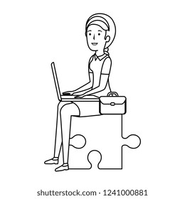 businesswoman sitting in puzzle piece with laptop