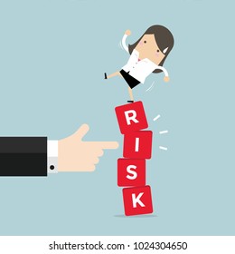 Businesswoman standing on shaky risk blocks by hand of manager. vector