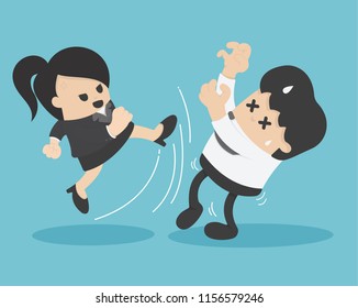 businesswoman in suit kicking businessman