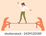 Businesswoman takes risks, walking thin tightrope in hands of employer, demonstrating ability to balance while achieving goal. Successful girl in business clothes shows balance skills