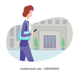Businesswoman wearing formal suit and holding mobile phone goes along street to work. Cartoon office worker character. Street style. Business building on backdrop. Vector flat cutout illustration