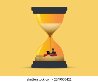 Businesswoman work inside a sand clock or hourglass representing deadline. productivity and time management concept.