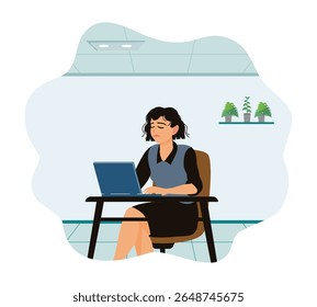 Businesswoman working in front of computer. Young woman feeling tired after busy working in office.