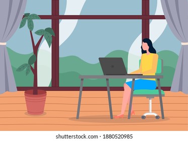 Businesswoman working with laptop sitting near panoramic window in office. Brunette woman working with computer sitting at desk. High green plant in pot. Business lady typing text at keyboard