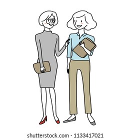 Businesswomen carrying document folders and talking to each other after work. Woman talk. Woman life concept with office lady such as colleagues smiling and talking to each other at workplace. 