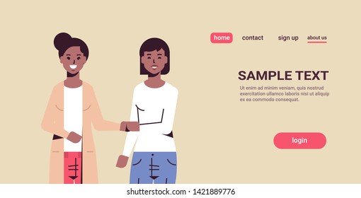 businesswomen handshaking business partners couple hand shake during meeting agreement partnership concept african american female colleagues standing together portrait copy space horizontal