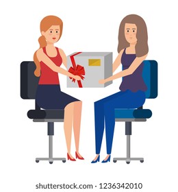 businesswomen sitting in office chair giving gift