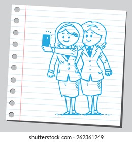 Businesswomen taking selfie