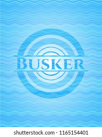 Busker light blue water style badge.