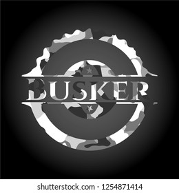 Busker on grey camouflage texture