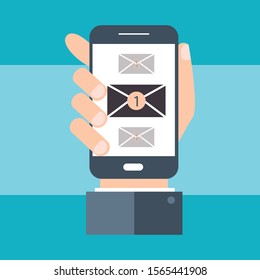 Bussniess man holding smartphone with email symbol on the blank screen. New message on the smartphone screen concept
