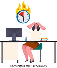 Busy businesswoman stressed due to excessive work. Female employee doing tasks with computer to deal with deadlines in office. Woman sitting at workplace and looking scared at burning clock