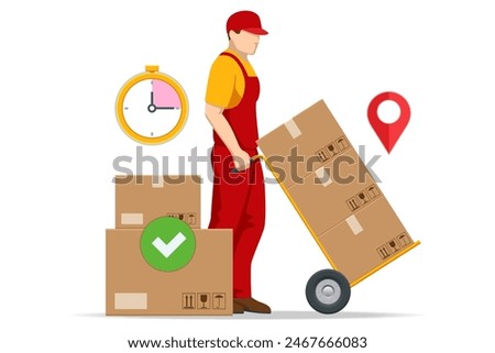 Busy delivery man pushing hand truck stacked with delivery packages Delivery service and transport logistics.