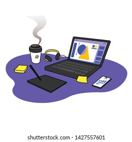 Busy and productive office desk with laptop computer, coffee cup, headphones, drawing tablet, sticky notes and smartphone.