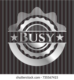 Busy silver shiny emblem
