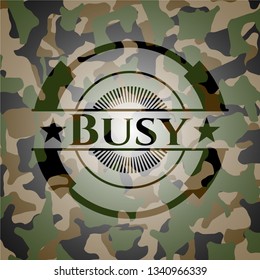 Busy written on a camo texture