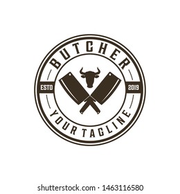 Butcher badge logo with cleaver and cow's head silhouette