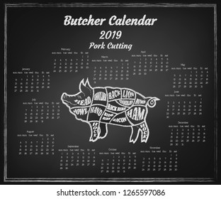 Butcher calendar with scheme of pork cutting in 2019. Christmas card with Chinese symbol of the yearStylized as a chalk Board for restaurant, butcher shop and grill bars menus or 
advertising banner.