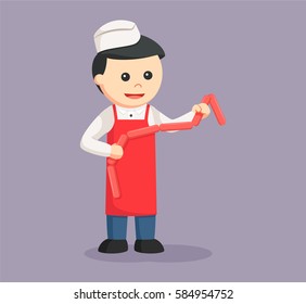 butcher man holding raw sausage