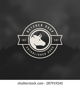 Butcher Shop Design Element in Vintage Style for Logotype, Label, Badge and other design. Cow face and knife retro vector illustration.
