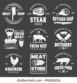 Butcher shop monochrome emblems with farm animals and meat fresh products on black background isolated vector illustration